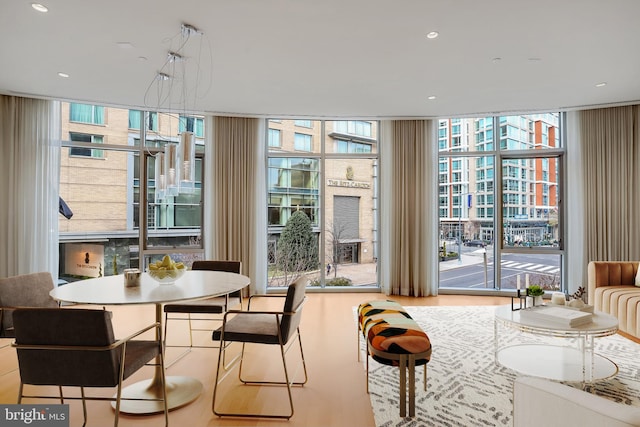 dining area with floor to ceiling windows