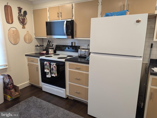 kitchen featuring dark hardwood / wood-style floors, cream cabinets, white appliances, crown molding, and tasteful backsplash