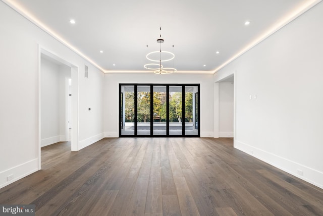 unfurnished room featuring dark wood-type flooring