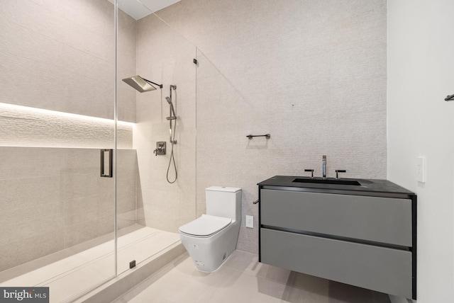 bathroom with toilet, tile walls, an enclosed shower, and vanity