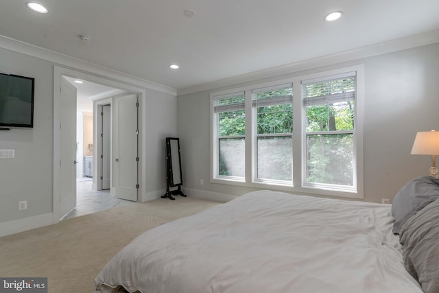 bedroom with baseboards, ornamental molding, recessed lighting, and light colored carpet