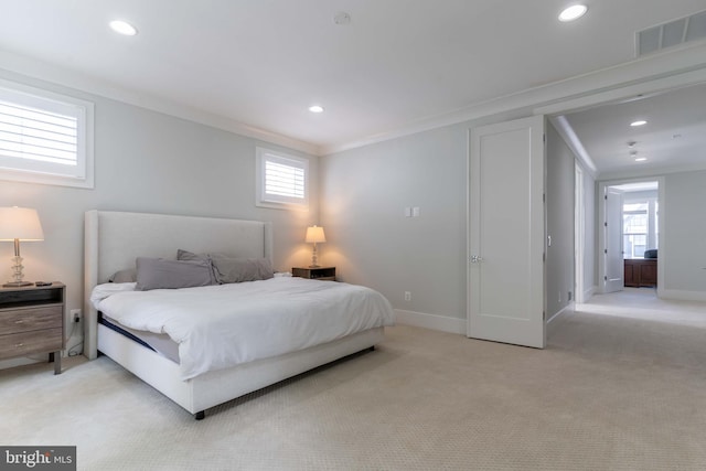 bedroom featuring light colored carpet, recessed lighting, visible vents, baseboards, and crown molding