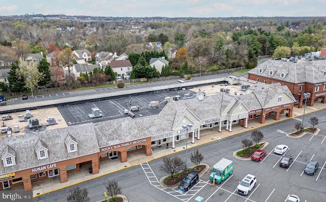 birds eye view of property with a residential view