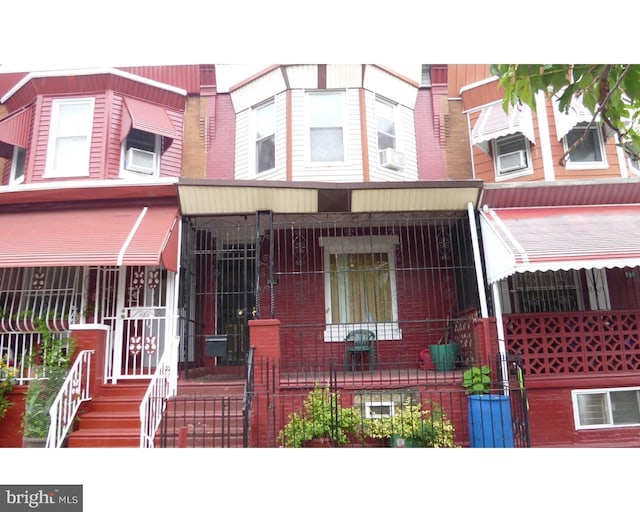 view of property with covered porch