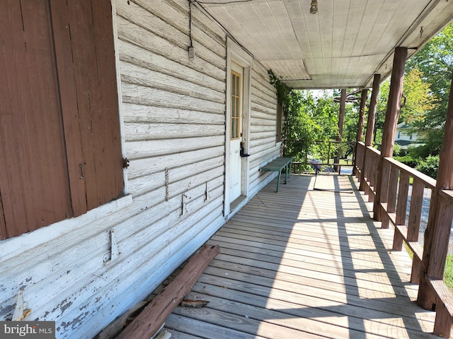 wooden deck featuring a porch