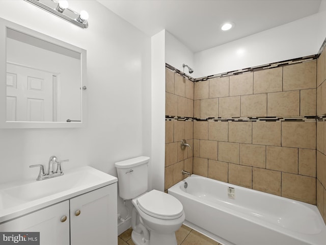 bathroom with shower / bathing tub combination, vanity, toilet, and tile patterned floors