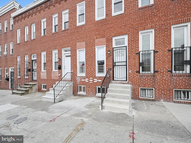 view of building exterior featuring entry steps