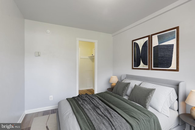 bedroom featuring hardwood / wood-style floors