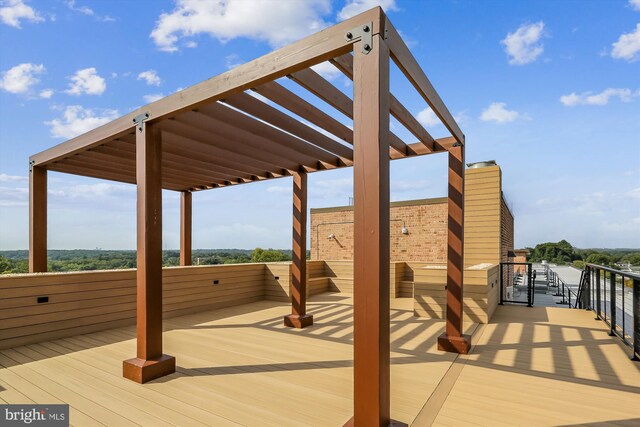 wooden terrace featuring a pergola