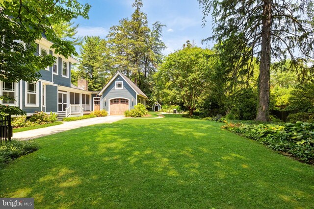 view of yard with a garage