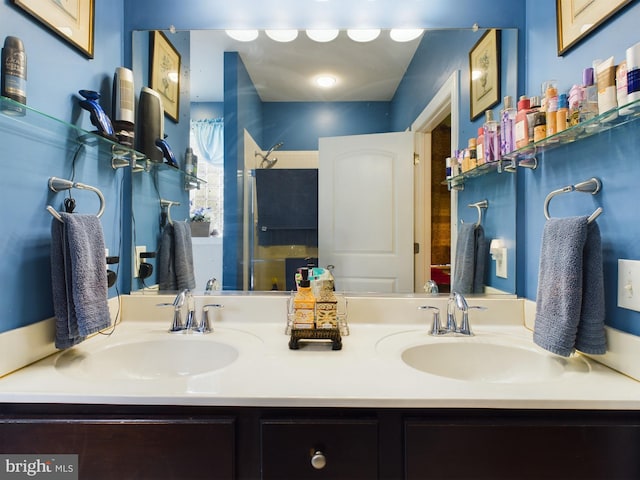 bathroom with vanity and walk in shower