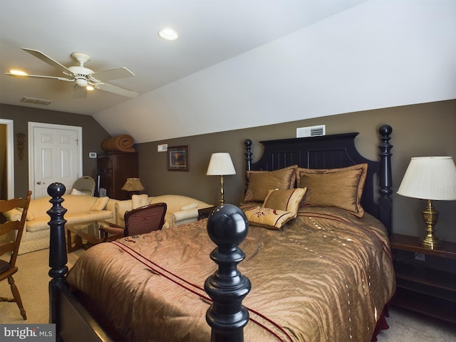 carpeted bedroom featuring vaulted ceiling and ceiling fan