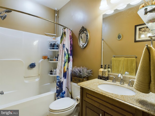 full bathroom featuring vanity, toilet, and shower / bath combo