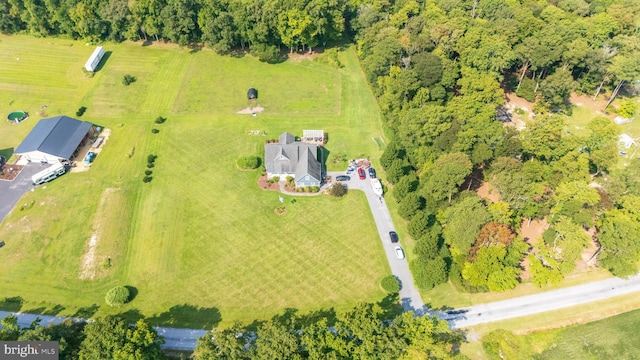 birds eye view of property featuring a rural view