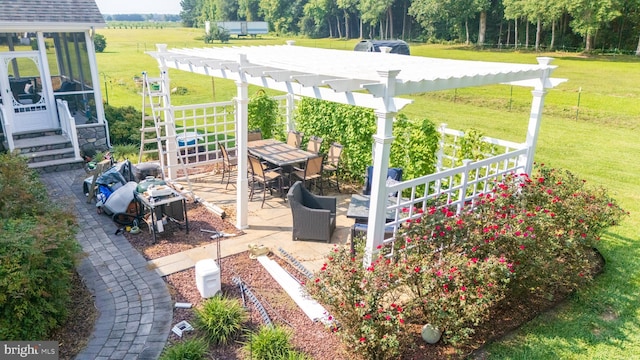 view of patio featuring a pergola and a rural view