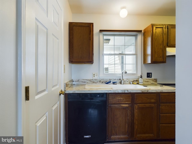 kitchen with dishwasher and sink