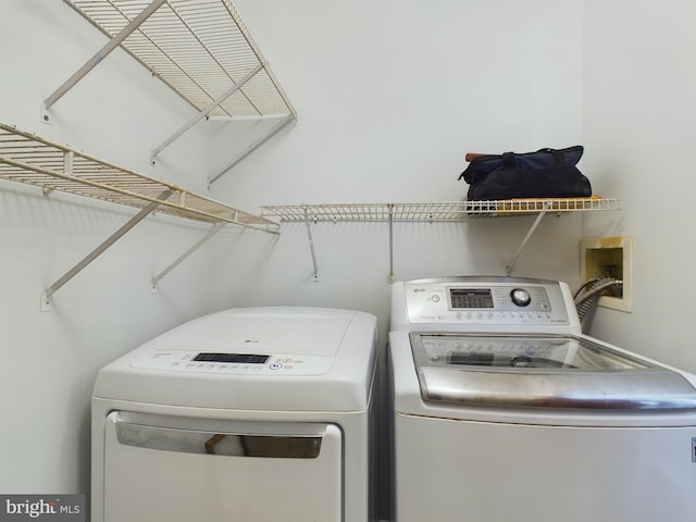 laundry area with washer and dryer