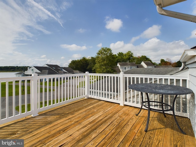 deck featuring a water view