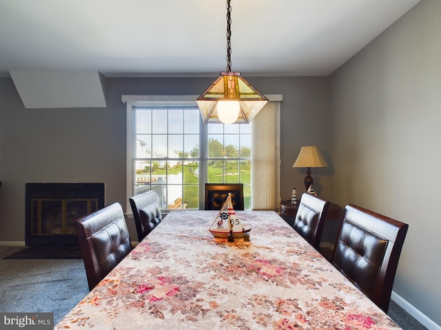 view of carpeted dining area