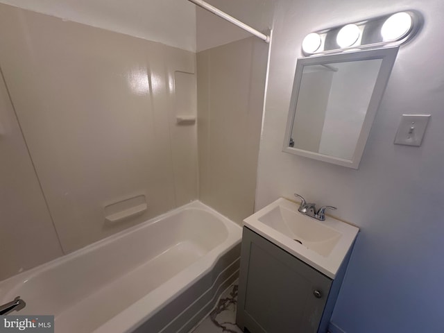 bathroom featuring tub / shower combination and vanity