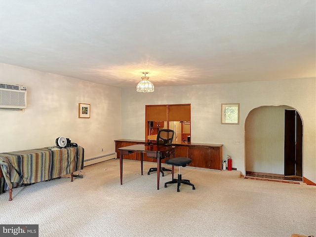 carpeted office space featuring baseboard heating, a wall mounted AC, and a chandelier