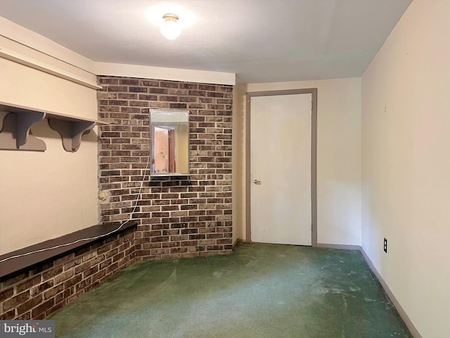 unfurnished living room featuring carpet flooring