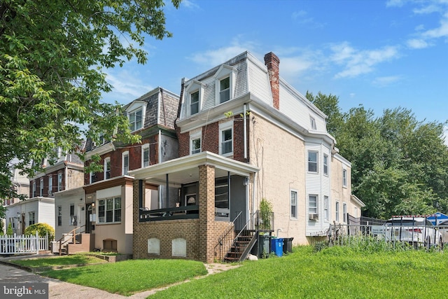 exterior space with a front yard