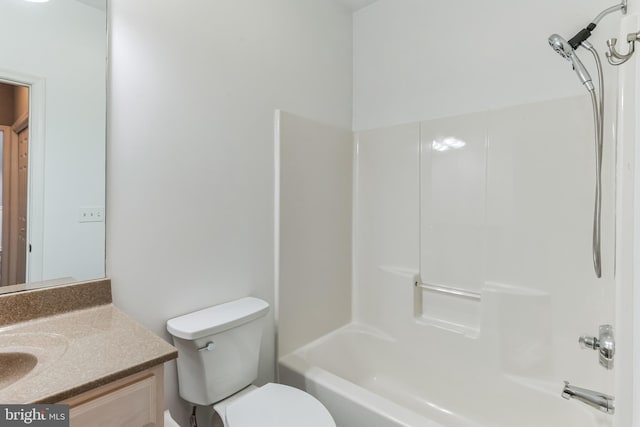 full bathroom with tub / shower combination, toilet, and vanity