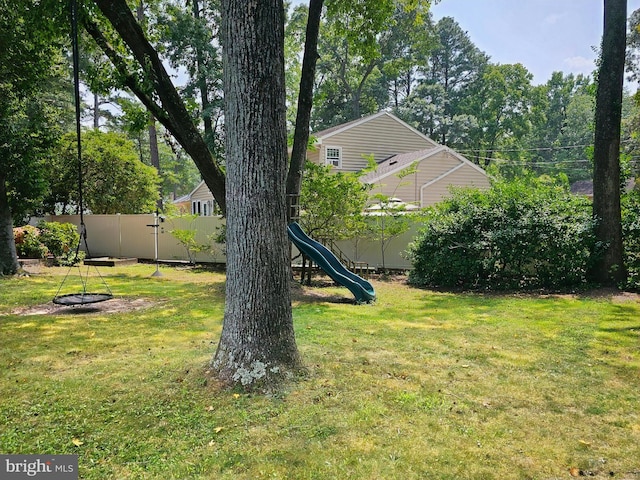 view of yard with a playground