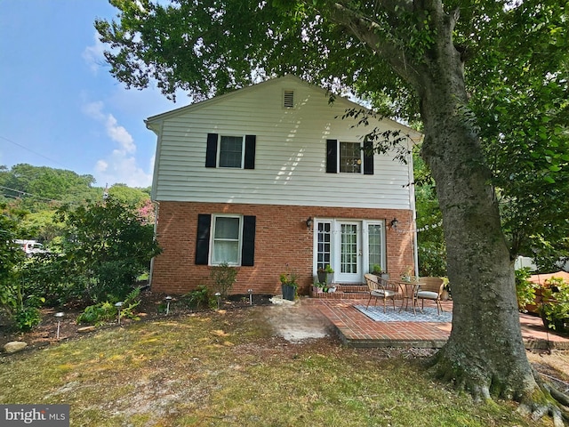 rear view of house with a patio