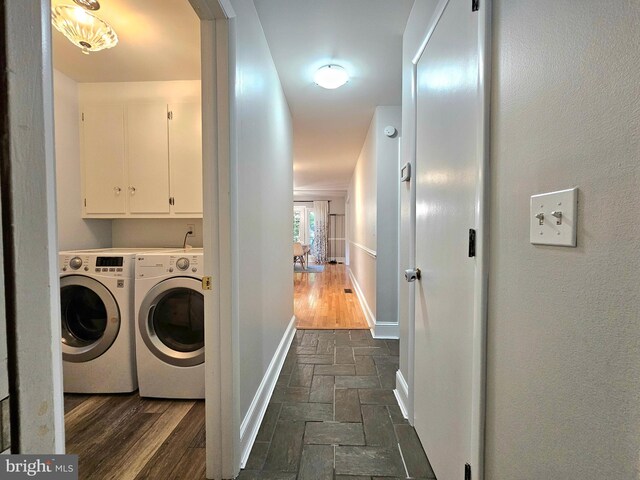 kitchen featuring light hardwood / wood-style flooring, decorative backsplash, dark brown cabinetry, stainless steel fridge, and black range with electric cooktop