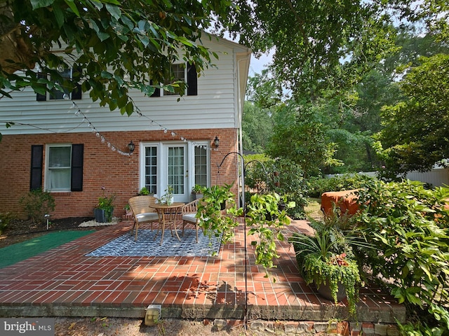 back of property with a patio area