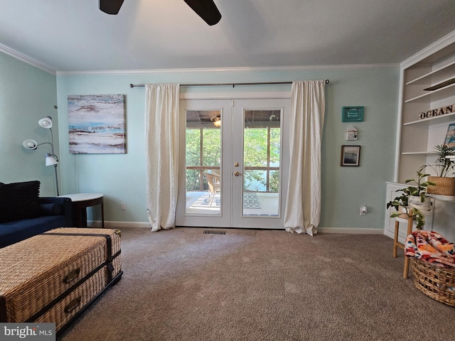 living area with carpet floors, ceiling fan, crown molding, and french doors