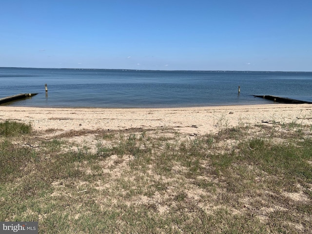 view of water feature with a beach view