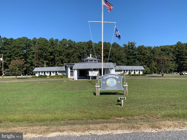 view of community featuring a lawn