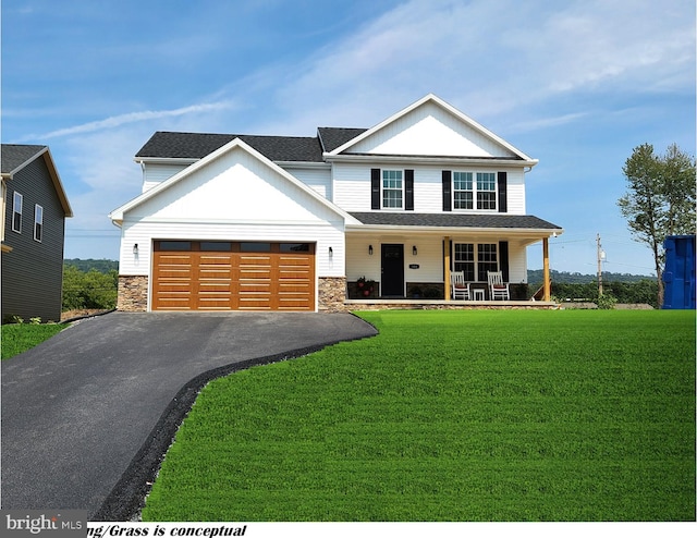 view of front facade featuring a garage, a front lawn, and covered porch