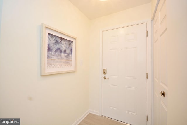 doorway to outside with light hardwood / wood-style flooring