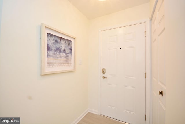 doorway featuring hardwood / wood-style flooring