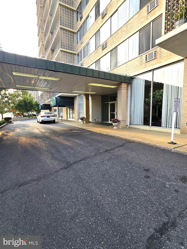 exterior space with a carport