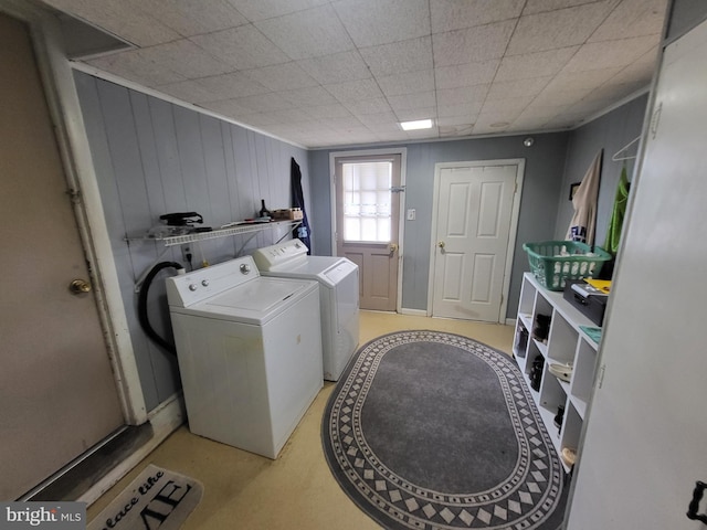 laundry area featuring washing machine and clothes dryer