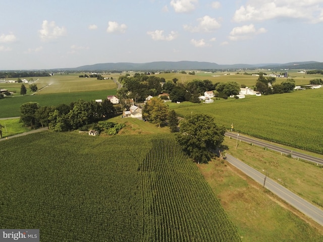 aerial view featuring a rural view and a mountain view