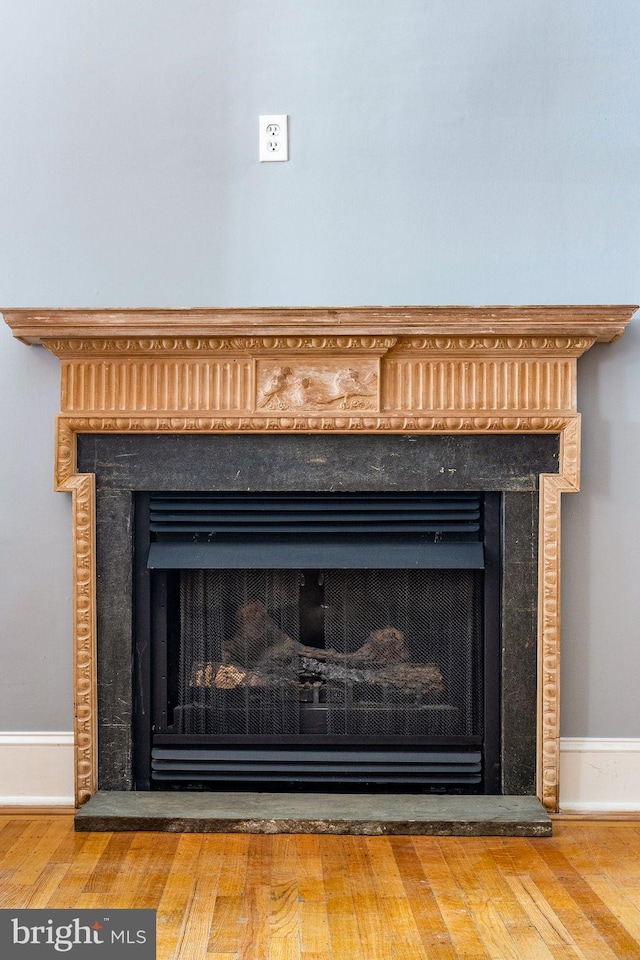 interior details featuring wood-type flooring