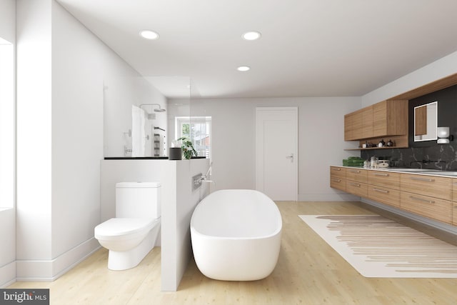 full bathroom featuring toilet, tasteful backsplash, shower with separate bathtub, vanity, and hardwood / wood-style flooring