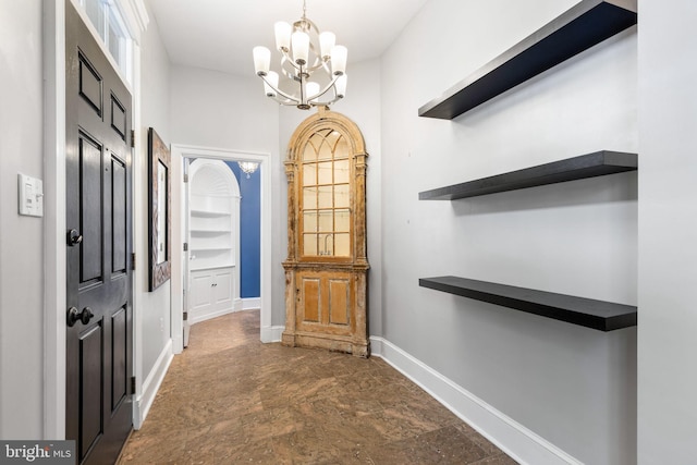 interior space with a chandelier