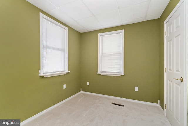 unfurnished room featuring carpet floors