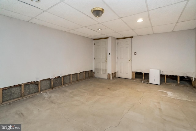 interior space featuring a paneled ceiling