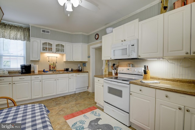 kitchen featuring tasteful backsplash, crown molding, white cabinets, white appliances, and ceiling fan