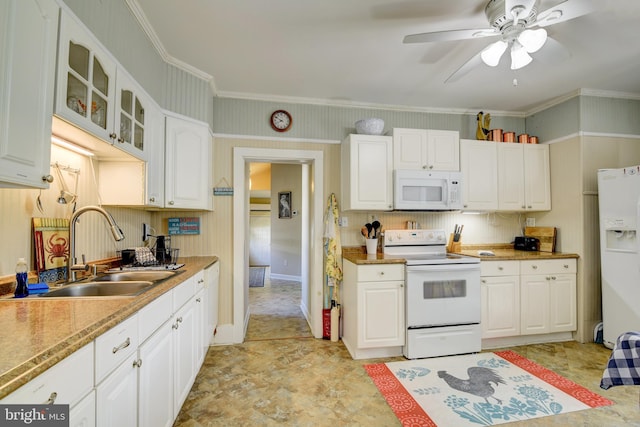 kitchen featuring sink, white cabinets, white appliances, ceiling fan, and light tile patterned flooring