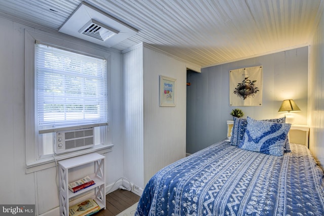 bedroom featuring hardwood / wood-style floors