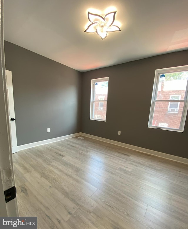 1636 Fillmore St, Philadelphia, PA 19124 - empty room with light wood-style floors and baseboards